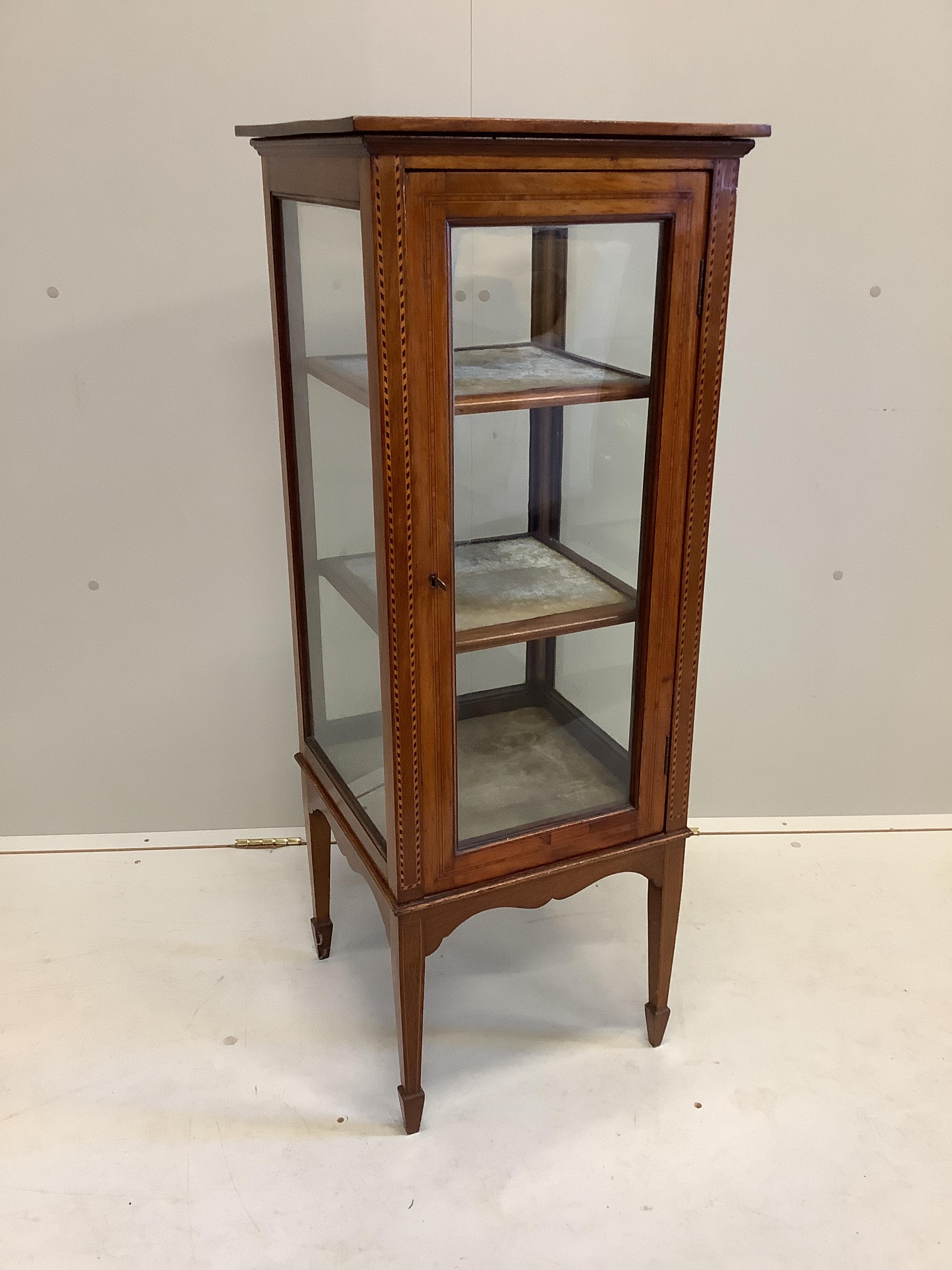 An Edwardian inlaid mahogany bijouterie cabinet, width 41cm, depth 40cm, height 110cm.